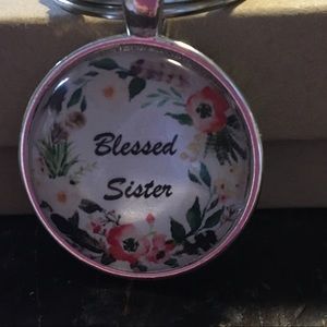 Blessed sister necklace or keychain. NEW